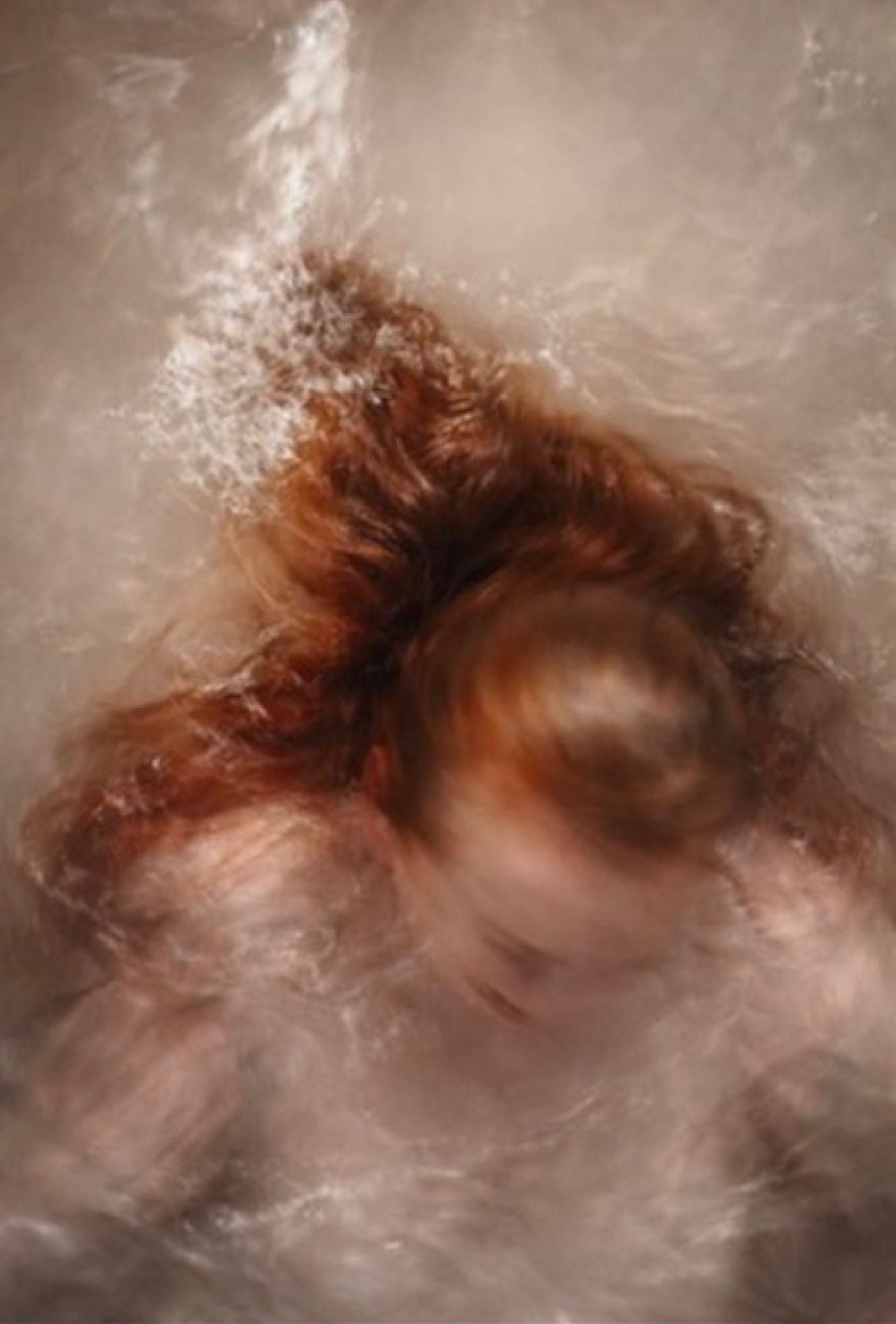 Underwater self-portrait by Elena Henneberg